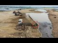 Heavy Machinery Bulldozer Wheel Loader And Dump Trucks Load Of Limestone Remove Water