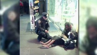 NYC cop gives boots to barefoot man