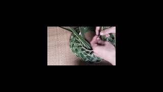 Making hats from coconut leaves