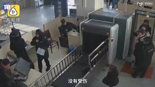 Moment five-year-old girl climbs into baggage X-ray machine