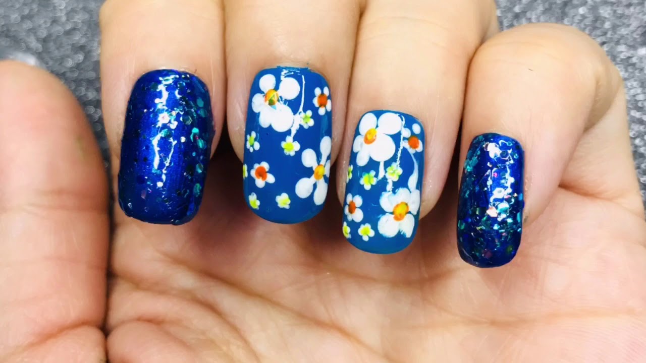 4. Baby Blue Floral Nail Design - wide 5