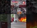 CCTV Captures Freight Train Crashing Into Bus in Bangkok