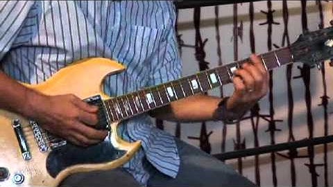 Blues Harmony Guitar Lesson @ GuitarInstructor.com (excerpt)