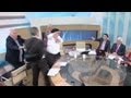 Greek politician throws water smacks female opponent