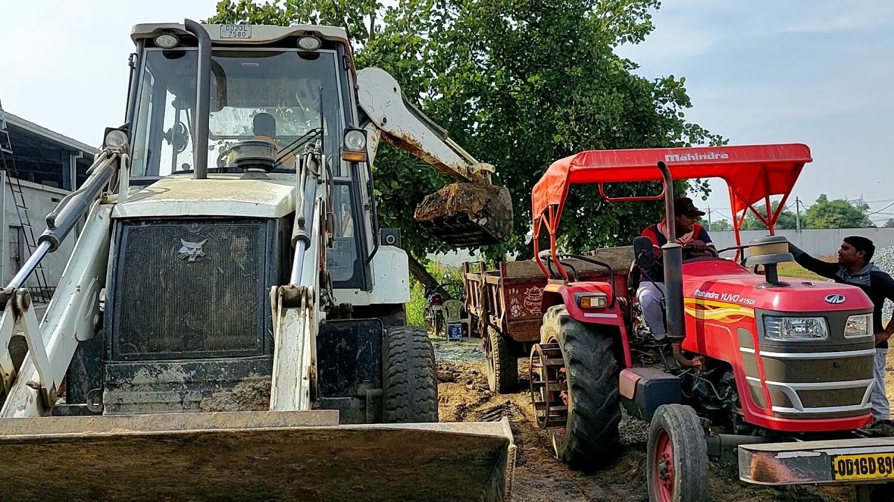 JCB 3DX Backhoe And Tractors Working For Road Construction At Plant