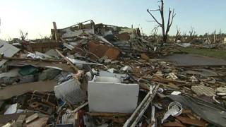 Joplin, Mo. residents pick up the pieces