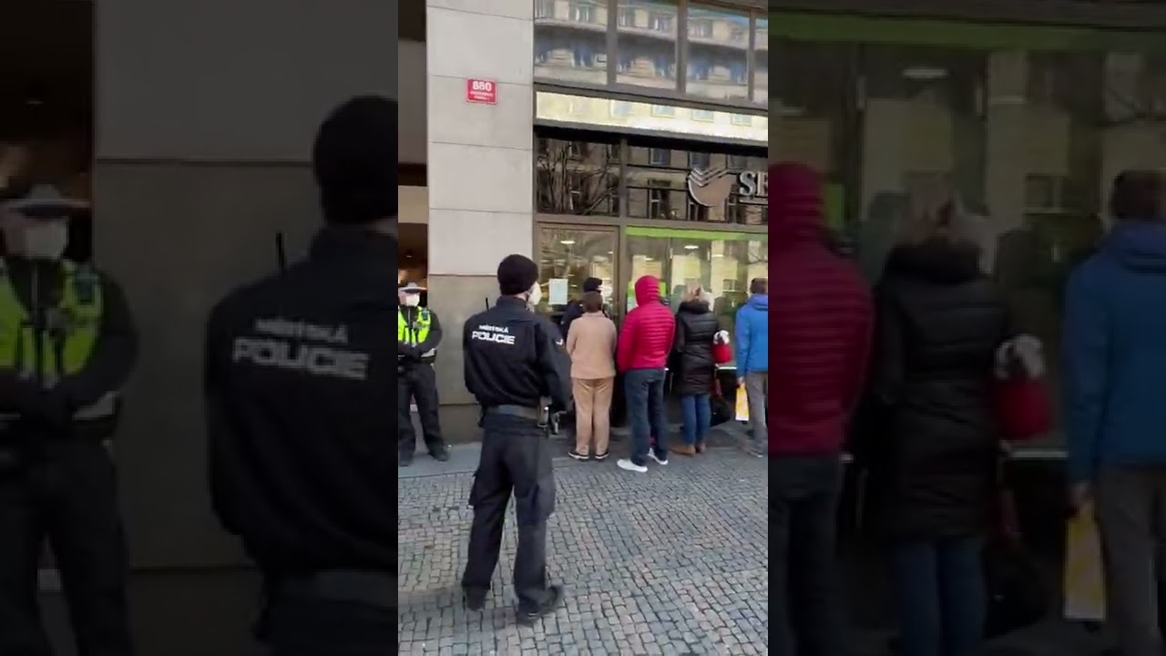 Czech police wearing Ukrainian flags, shut down Russian bank in Prague just now