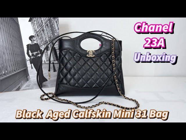 Chanel 23A Black Aged Calfskin Mini 31 Bag with Champagne Gold