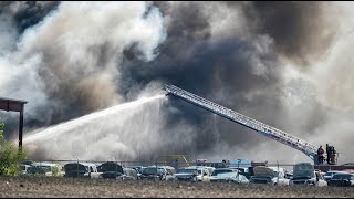 Fire at Washington Park auto parts salvage yard.