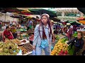 Cambodian street food at city market  delicious durian fruit fish vegetables  more