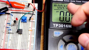 393 comparator circuit using LM393 open collector output and 2N2222 NPN bipolar junction transistor