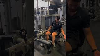 Seated knee extension machine demonstration