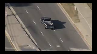 Police chase double murder suspect and driver in pickup truck with Benny Hill Theme