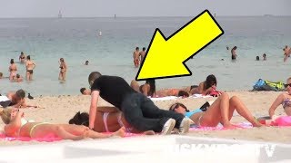 Man touching bikini babe's Ass at open beach. watch till end what she does next!!