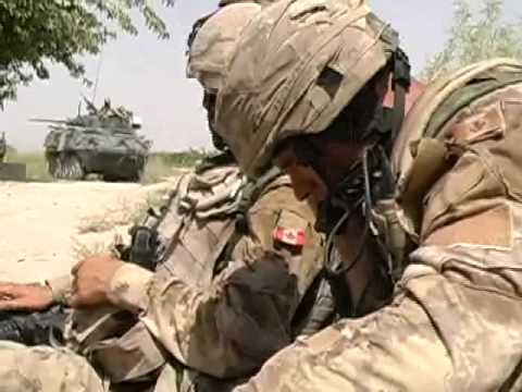 Soldiers are searching for drugs and weapons (Operation Archer), they are ambushed in tiny village, 8 July 2006, 25 km west of Kandahar, South Afghanistan