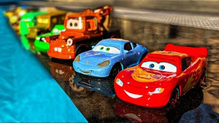 Disney Pixar Cars falling into deep pool, Lightning McQueen, Tow Mater, Mack, Sally, Francesco