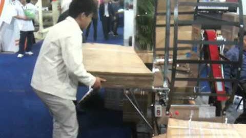 Chang Yong Tying Machine CY-100 ties big cardboard.MOV
