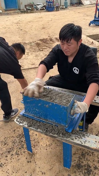 Small manual stock brick making machine mobile egg laying hollow concrete