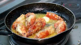 Royal Cossa with garlic, lemon butter and parsley, Jolof rice