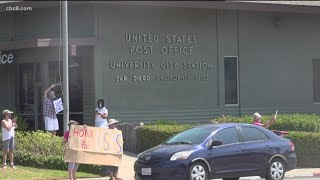 Activists rally across San Diego to support the U.S. Postal Service