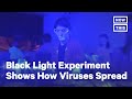 Black Light Experiment Shows How Quickly COVID-19 Can Spread | NowThis