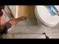 how to cut laminate vinyl FLOORING around toilet doors bath cabinets ANYTHING easy DIY
