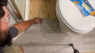 how to cut laminate vinyl FLOORING around toilet doors bath cabinets ANYTHING easy DIY