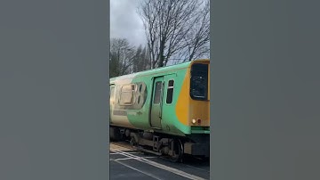 Class 313 speeds through level crossing #shorts #railway #train #class313