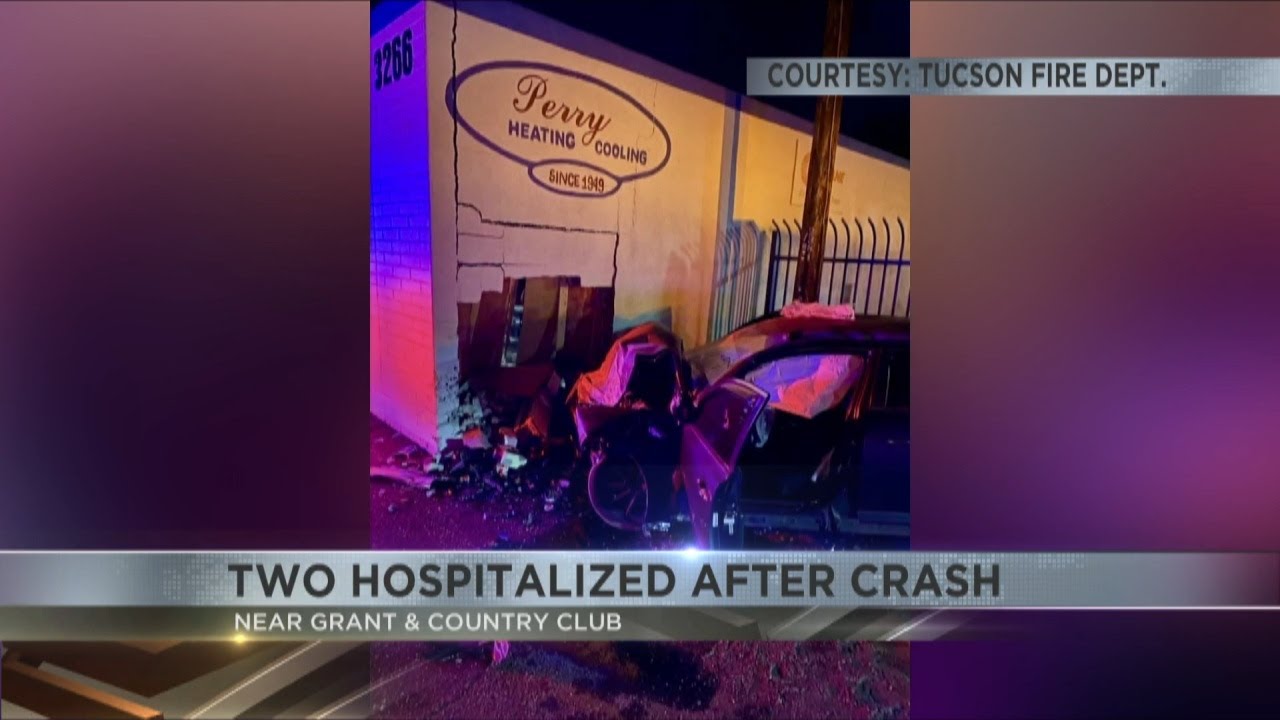 Two hospitalized after car crashes into wall in midtown Tucson