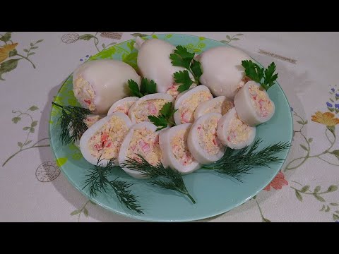 Кальмары фаршированные. Фарширую  крабовыми палочками и сыром, очень вкусно.