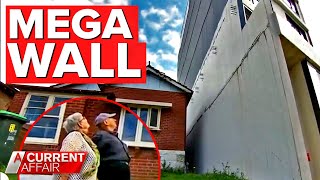 Eyesore 'mega wall' dwarfing couple's house | A Current Affair