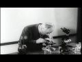 Professor Fritz Zernike demonstrates the 'Phase Contrast' microscope that earned ...HD Stock Footage