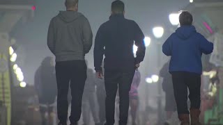 Protesters defy curfew in Huntington Beach