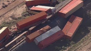 Wind blows train off track