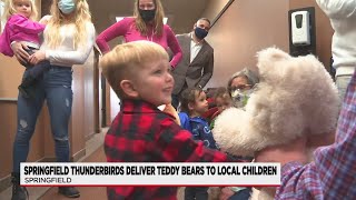 Springfield Thunderbirds distribute stuffed animals collected at Teddy Bear Toss
