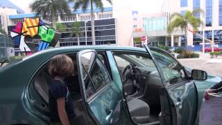 Miami Herald Wish Book: Sara and her mom presented with a car.