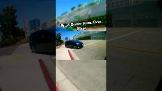 Prius Driver Runs Down Biker