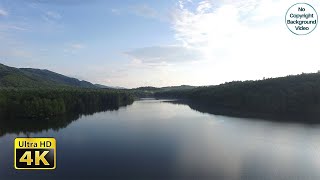 Calm Lake Mountains Trees Nature Landscape Aerial View Video Background screenshot 4