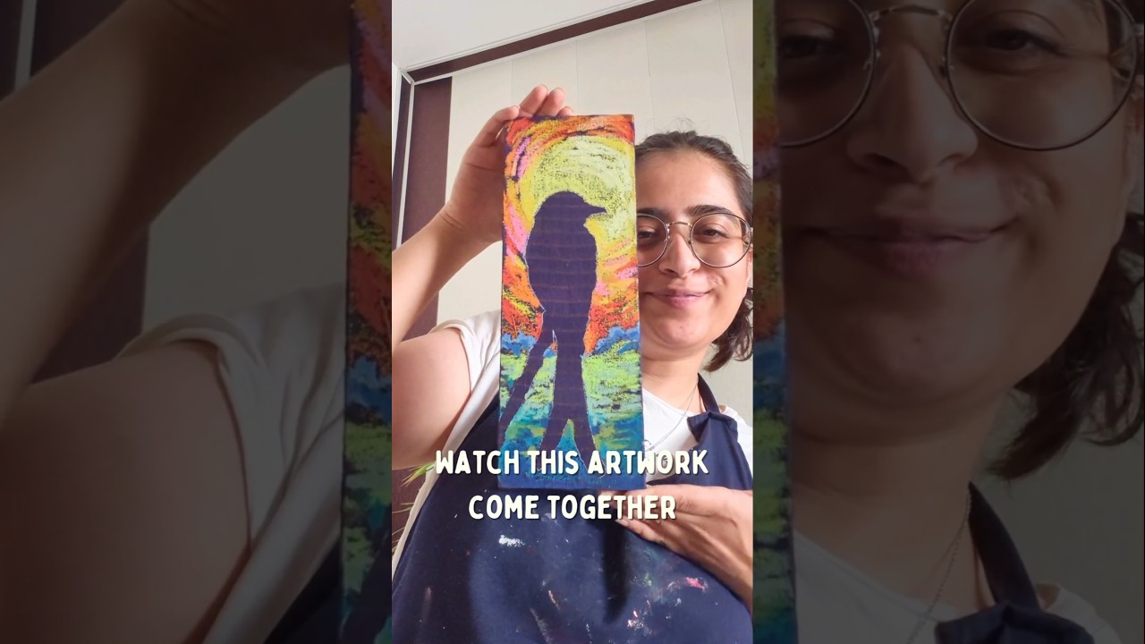 Capturing the silhouette of a Black Drongo bird in oil pastels on upcycled fabric 