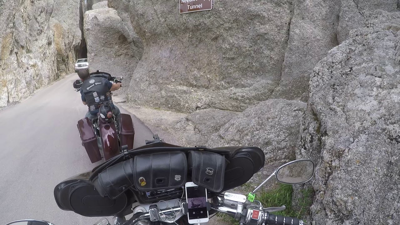 Riding through needles eye tunnel YouTube