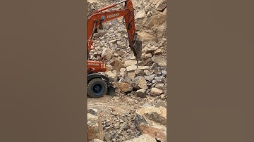 How a Stone Crusher Plant Works: excavator Breaking Big Rocks to Small #mm247