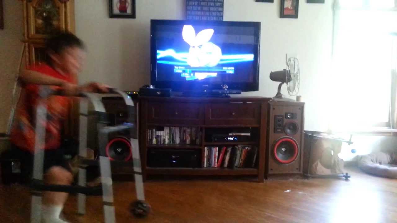 kid jumps over walker YouTube