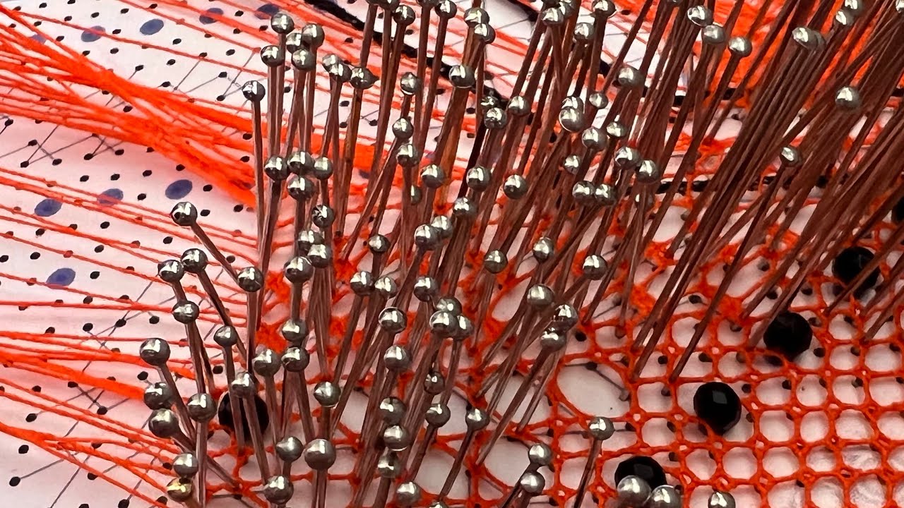 Paso del reseguido y arañas entrelazadas bolso de encaje de bolillos Raquel M Adsuar Bolillotuber