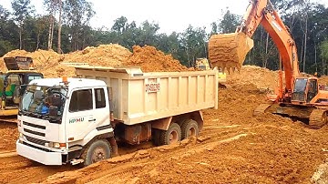 Heavy Equipment Excavator Loading Bauxite Into Dump Truck - Bauxite Mining Process