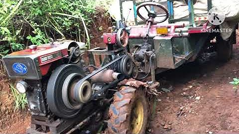 Xe công nông cầu trượt chở lúa lên dốc kéo tời