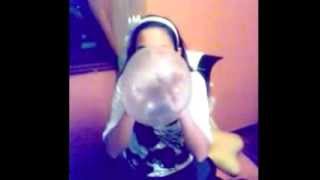 Girl Blowing Biggest Bubble Gum Bubble In Her Bed Room