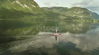 Stand Up Paddling On The Lake Stock Video   Download Video Clip Now   iStock