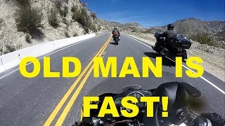 Old Guy on Touring Bike Goes 100+MPH with Crotch Rockets!