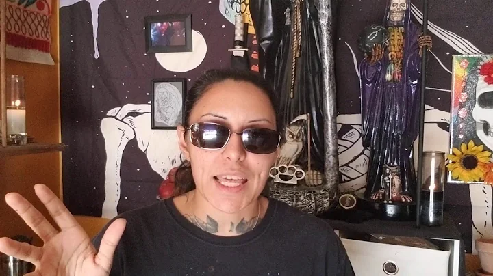 Santa Muerte's Scythe: Right or Left Side? Why?