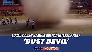 'Dust devil' interrupts local soccer game in Bolivia